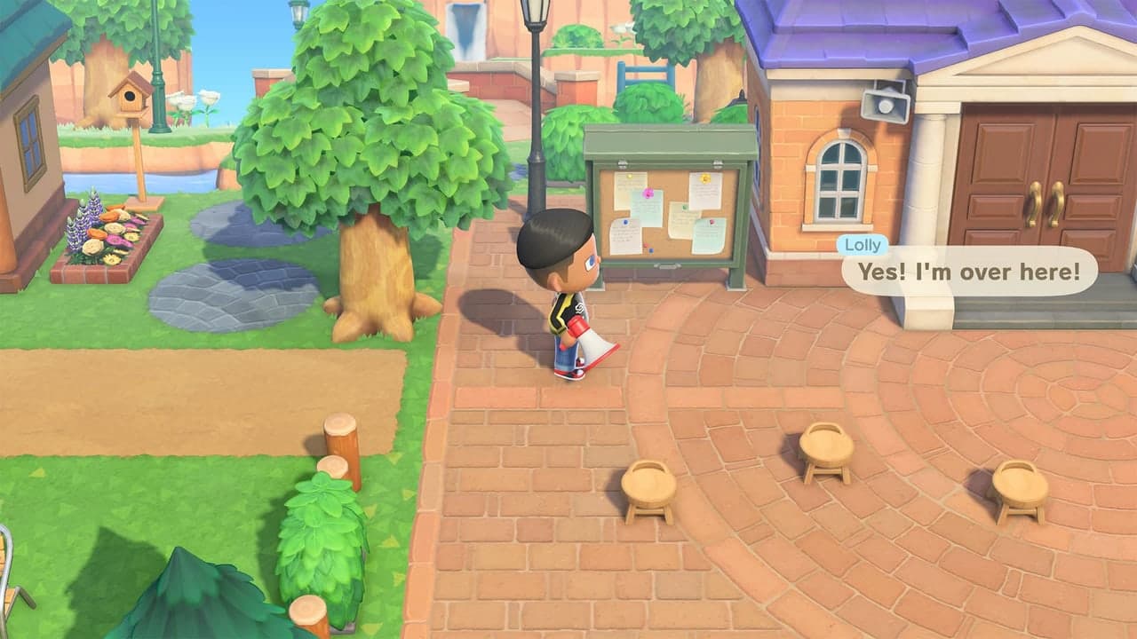 An Animal Crossing player uses a megaphone near Resident Services while Lolly answers.